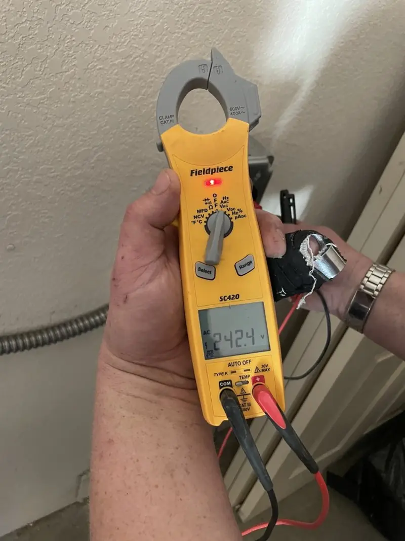 Voltage testing with clamp meter during Hot Tub / Pool Electrical Wiring in Savannah